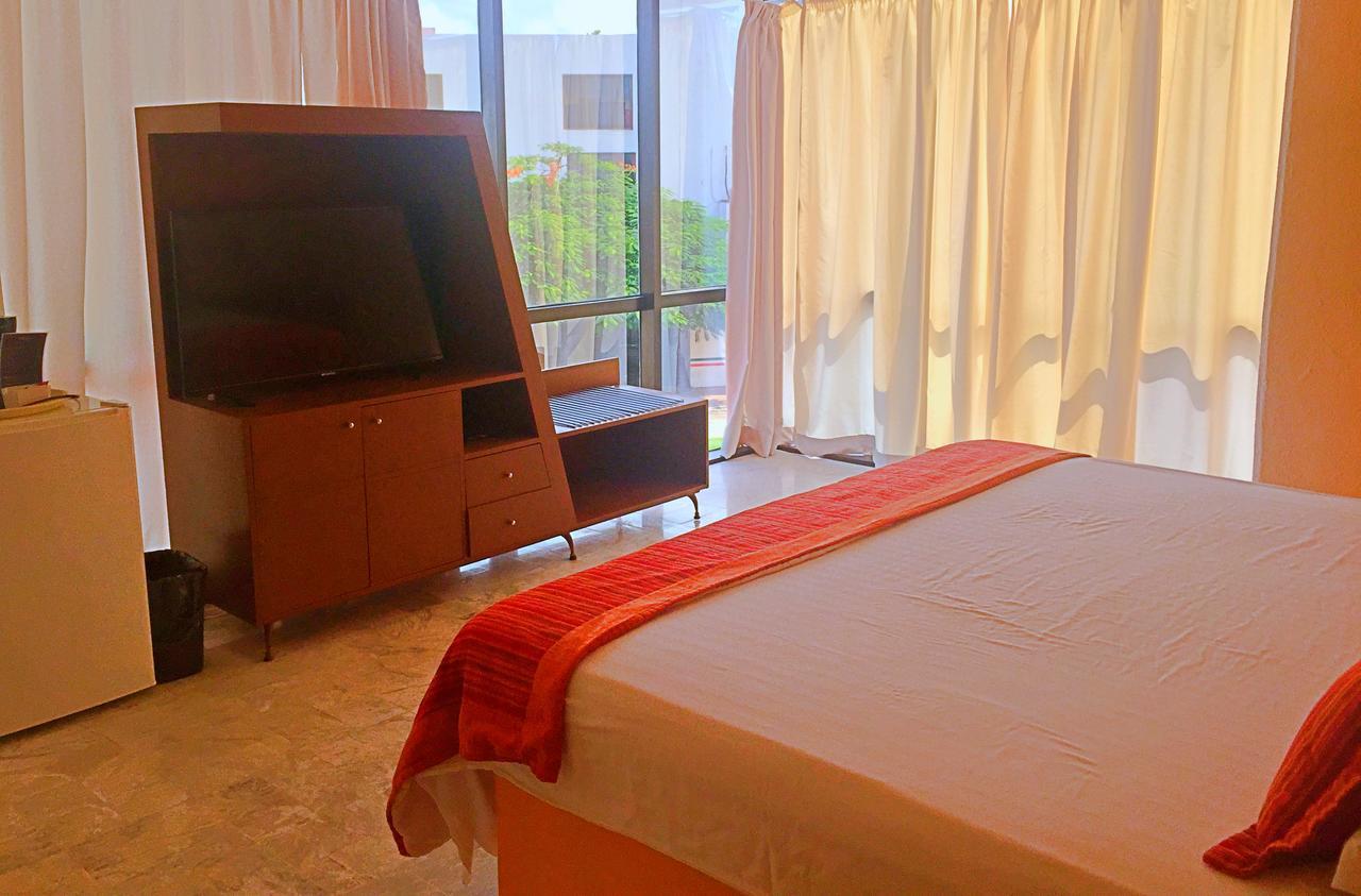 Hotel Versalles Suites Cancun Bagian luar foto