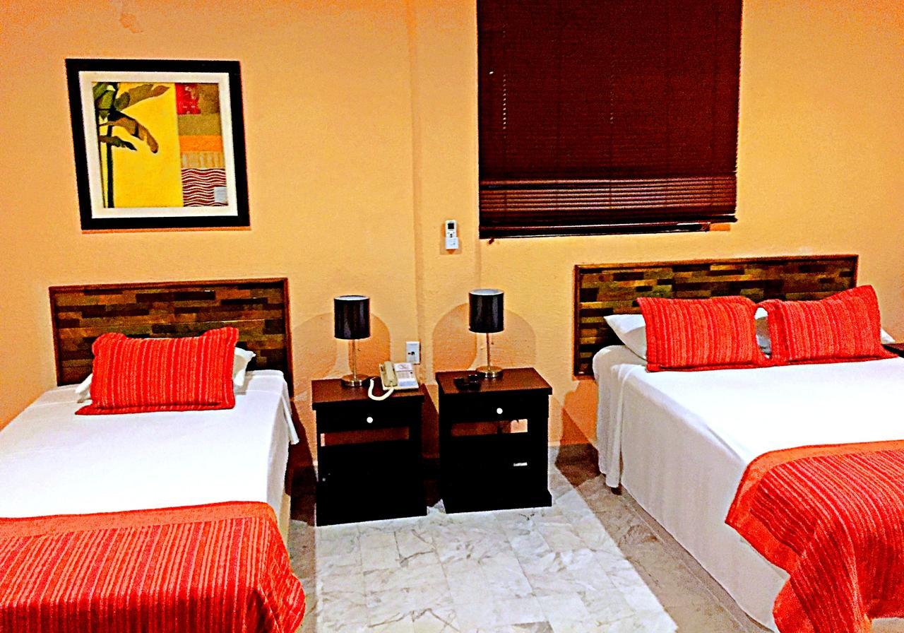 Hotel Versalles Suites Cancun Bagian luar foto