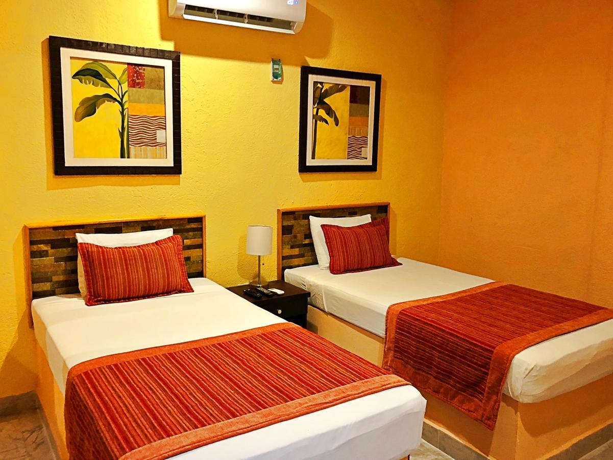 Hotel Versalles Suites Cancun Bagian luar foto