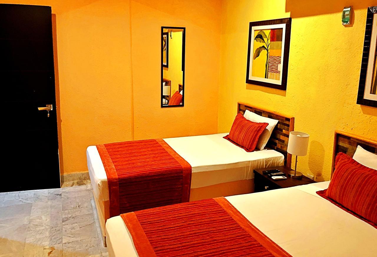 Hotel Versalles Suites Cancun Bagian luar foto