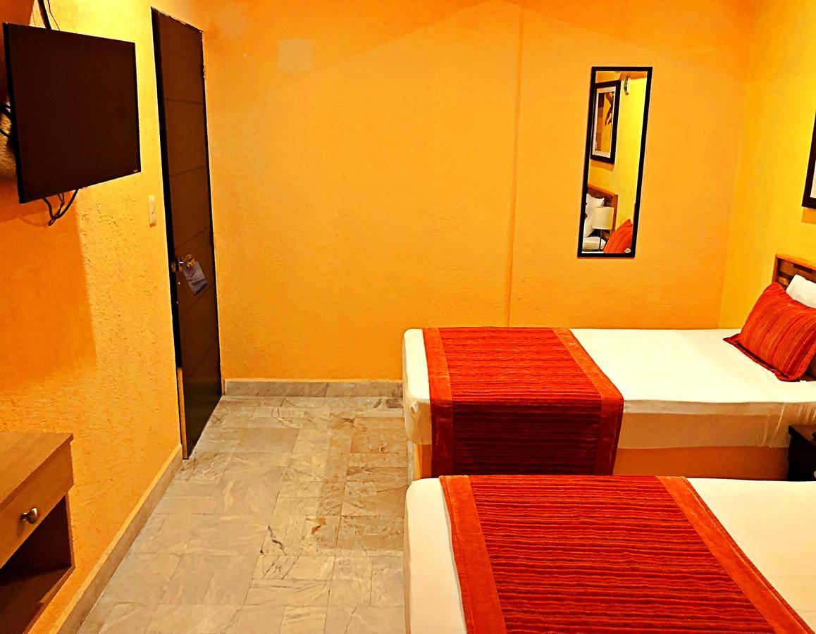 Hotel Versalles Suites Cancun Bagian luar foto